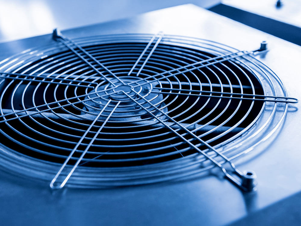 Close-up of a commercial HVAC condenser fan
